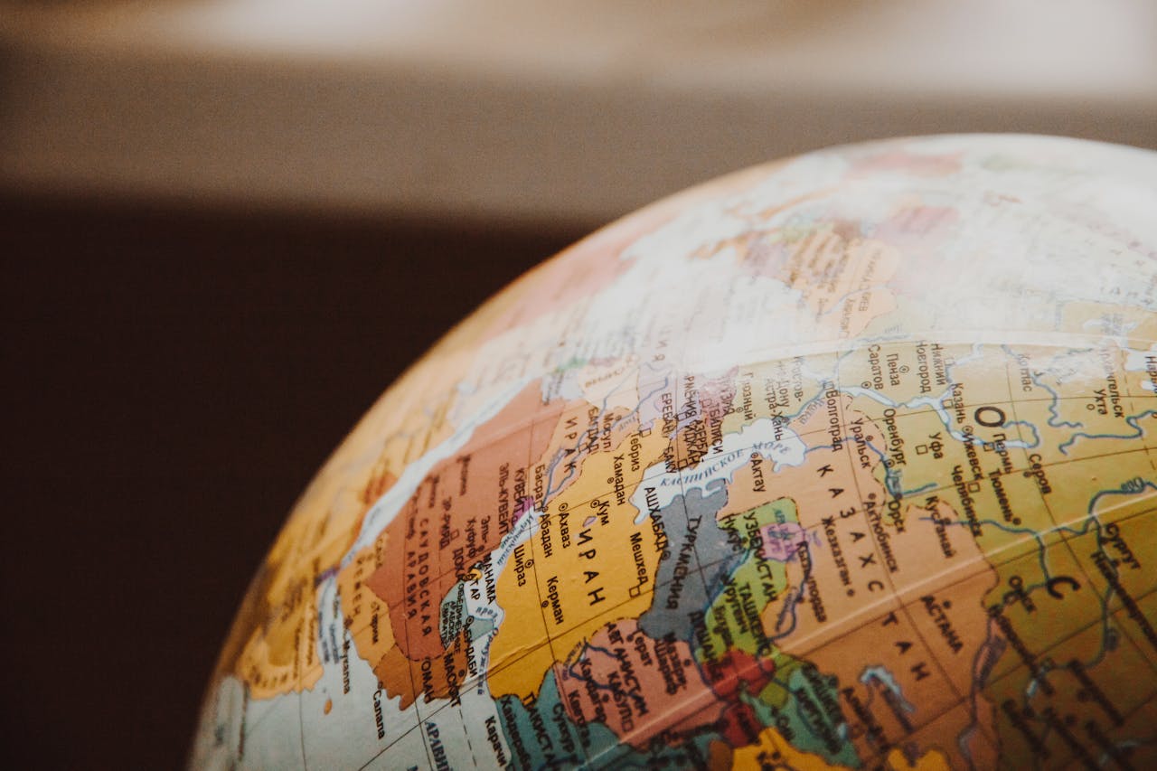 our-services-3 Detailed close-up of a globe showcasing parts of Europe and Asia for world exploration concepts.
