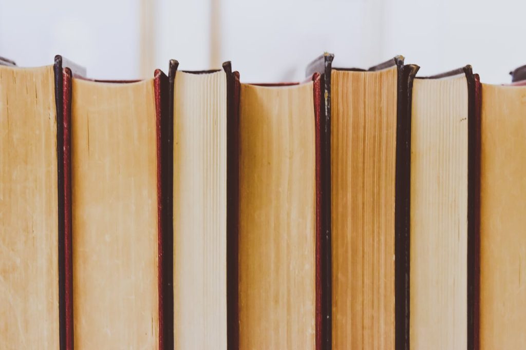 pexels photo 768125 Close-up view of vintage book bindings in a library setting.